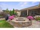 Outdoor patio with fire pit, seating area, and screened porch at 5003 Looking Glass Trl, Denver, NC 28037