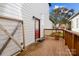 Exterior shot of a wood deck and door to the house at 511 E Main St, Rock Hill, SC 29730