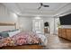 Spacious main bedroom with ensuite bathroom entry, wooden floors, and bright neutral paint at 511 E Main St, Rock Hill, SC 29730