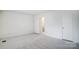 Spacious bedroom with neutral walls and carpeting at 6102 Heath Ridge Ct # G, Charlotte, NC 28210