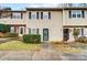 Attractive tan two-story townhouse exterior at 6102 Heath Ridge Ct # G, Charlotte, NC 28210