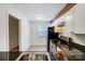 Modern white kitchen with granite countertops at 6102 Heath Ridge Ct # G, Charlotte, NC 28210