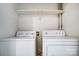 Stackable washer and dryer in a small laundry closet at 6102 Heath Ridge Ct # G, Charlotte, NC 28210