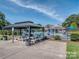 Relaxing pool area with gazebo and picnic tables at 6102 Heath Ridge Ct # G, Charlotte, NC 28210