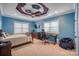 Youth bedroom with a soccer-themed ceiling and built-in desk at 9267 Egret Rdg # 41, Belmont, NC 28012