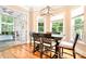 Bright breakfast nook features hardwood floors and access to a sunroom at 9267 Egret Rdg # 41, Belmont, NC 28012