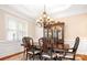 Formal dining room with chandelier and built-in hutch at 9267 Egret Rdg # 41, Belmont, NC 28012