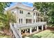 Home with a large deck, stairs, and a spacious backyard at 9267 Egret Rdg # 41, Belmont, NC 28012