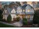 Stunning two-story home with charming curb appeal and festive lighting at 9267 Egret Rdg # 41, Belmont, NC 28012