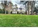 Landscaped lawn with two story house in the background at 9267 Egret Rdg # 41, Belmont, NC 28012