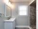Updated bathroom with double vanity and shower at 406 Harris Ln, Monroe, NC 28112