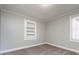 Bedroom with built-in shelving and neutral decor at 406 Harris Ln, Monroe, NC 28112