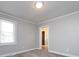 Bright bedroom featuring a view into the bathroom at 406 Harris Ln, Monroe, NC 28112