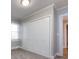 Bedroom with double door closet and neutral wall at 406 Harris Ln, Monroe, NC 28112