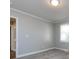 Spacious bedroom with grey walls and carpet flooring at 406 Harris Ln, Monroe, NC 28112