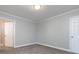 Simple bedroom with grey walls and carpet at 406 Harris Ln, Monroe, NC 28112
