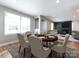 Elegant dining room with a round table and modern chairs at 406 Harris Ln, Monroe, NC 28112