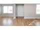 Bright entryway with hardwood floors and neutral walls at 406 Harris Ln, Monroe, NC 28112