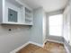 Laundry area with shelving and built-in electrical panel at 406 Harris Ln, Monroe, NC 28112