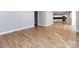 Open living space with hardwood floors and kitchen views at 406 Harris Ln, Monroe, NC 28112