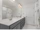 Shared bathroom with double vanity and hexagon tile floor at 650 Preservation Dr, Fort Mill, SC 29715