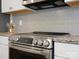 Stainless steel appliances and granite countertops in this modern kitchen at 829 River Park Rd, Belmont, NC 28012