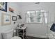 Simple bathroom with toilet and window at 110 Fern Haven Ln, Mooresville, NC 28117