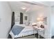 Cozy bedroom with window and a side table at 110 Fern Haven Ln, Mooresville, NC 28117
