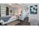 Bright bedroom with a comfortable bed and lake view at 110 Fern Haven Ln, Mooresville, NC 28117
