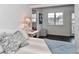 Bright bedroom with lake view and comfy bedding at 110 Fern Haven Ln, Mooresville, NC 28117