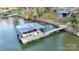 Covered boat dock with lift and walkway on the lake at 110 Fern Haven Ln, Mooresville, NC 28117