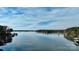 Scenic lakefront view with clear water and lush trees at 110 Fern Haven Ln, Mooresville, NC 28117