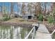 Charming lakefront home with private dock and steps to the lake at 110 Fern Haven Ln, Mooresville, NC 28117