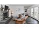Living area with stone fireplace and wicker chairs at 110 Fern Haven Ln, Mooresville, NC 28117