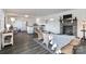 Open living space with kitchen, fireplace and seating at 110 Fern Haven Ln, Mooresville, NC 28117