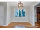Cozy dining room with bright windows and modern lighting fixtures at 13446 Idlefield Ln, Matthews, NC 28105