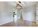 Dining area with wood floors and view of the kitchen at 13446 Idlefield Ln, Matthews, NC 28105