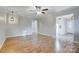 Spacious living room with beautiful hardwood floors and ample natural light at 13446 Idlefield Ln, Matthews, NC 28105