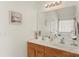 Bright bathroom with double sinks, spacious countertops, and a large mirror at 3015 Hendricks Chapel Ln, Charlotte, NC 28216