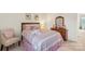 Bright bedroom with a large bed, soft lighting, and a cozy chair at 3015 Hendricks Chapel Ln, Charlotte, NC 28216