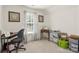 Multipurpose bonus room with desk area, sewing machine, and storage at 3015 Hendricks Chapel Ln, Charlotte, NC 28216
