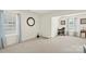 Spacious bonus room with ample windows and carpet flooring, can be used as an office at 3015 Hendricks Chapel Ln, Charlotte, NC 28216