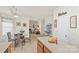 Kitchen with an open-concept layout, connecting dining and living areas, offering a seamless flow at 3015 Hendricks Chapel Ln, Charlotte, NC 28216