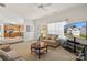 Bright living room with a view into the kitchen, showcasing an open layout and natural light at 3015 Hendricks Chapel Ln, Charlotte, NC 28216