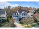 Aerial view of a two-story home with double porches, garage, and well-maintained landscaping at 428 Vintage Hill Ln, Huntersville, NC 28078