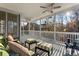 Comfortable back porch with ceiling fans and wooded views at 428 Vintage Hill Ln, Huntersville, NC 28078