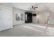 Bedroom with plush carpet, a ceiling fan, a closet, and lots of light from the windows at 428 Vintage Hill Ln, Huntersville, NC 28078