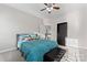 Bedroom with a soft bed, a ceiling fan, and a built in wardrobe at 428 Vintage Hill Ln, Huntersville, NC 28078