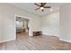 This bonus room features hardwood floors with access to the living room at 428 Vintage Hill Ln, Huntersville, NC 28078