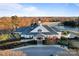 Stunning clubhouse with well-maintained landscaping, neutral paint, and inviting entrance at 428 Vintage Hill Ln, Huntersville, NC 28078
